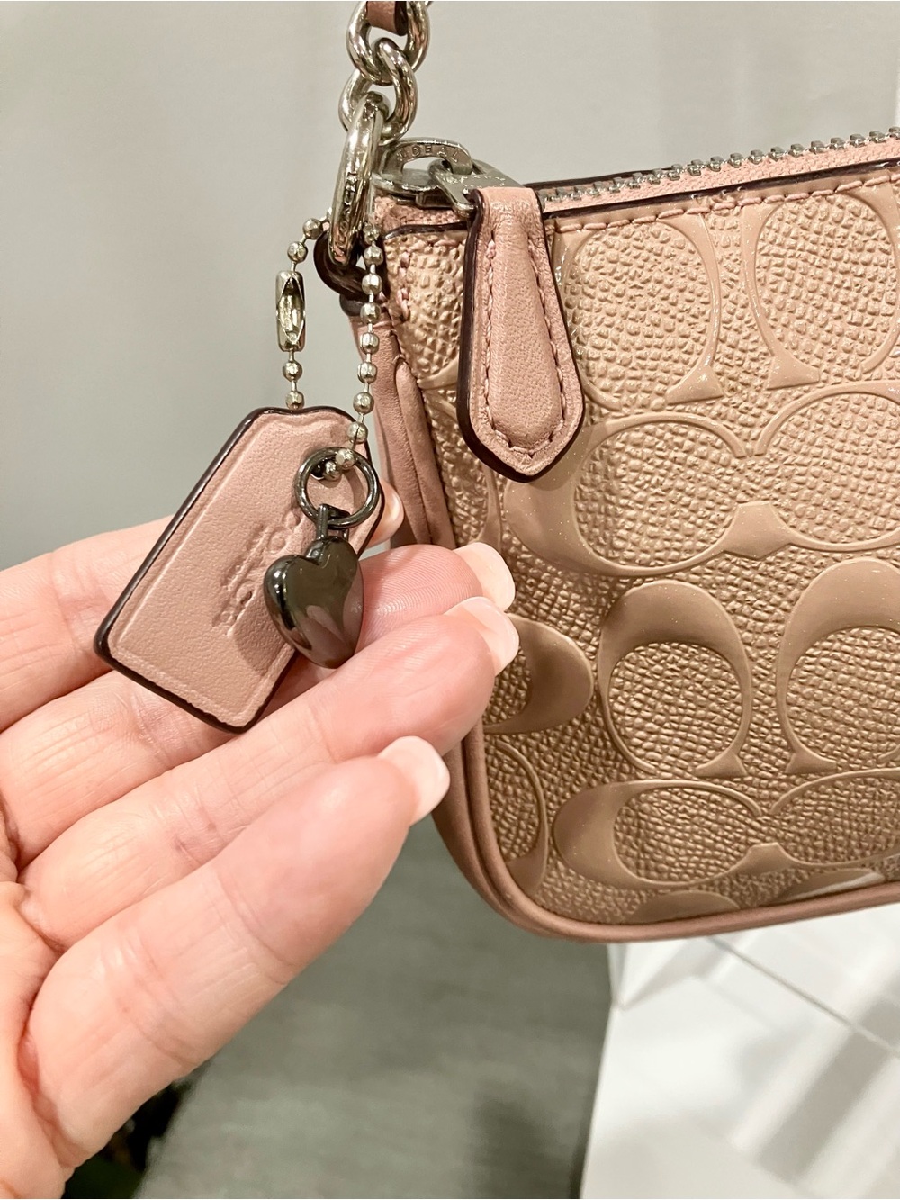 Coach Nolita in Signature Embossed Patent Leather in a pink/blush shade - Picture 8 of 11